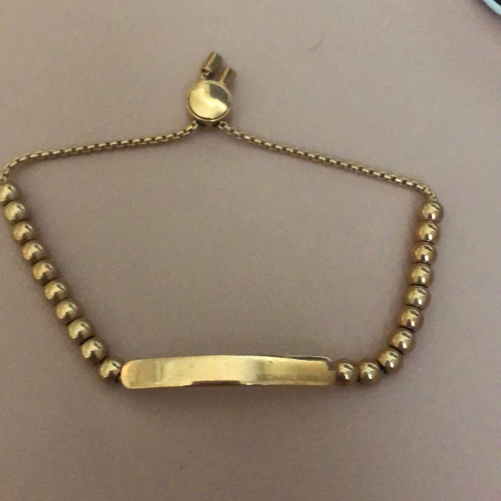 Micheal Kors gold bracelet
